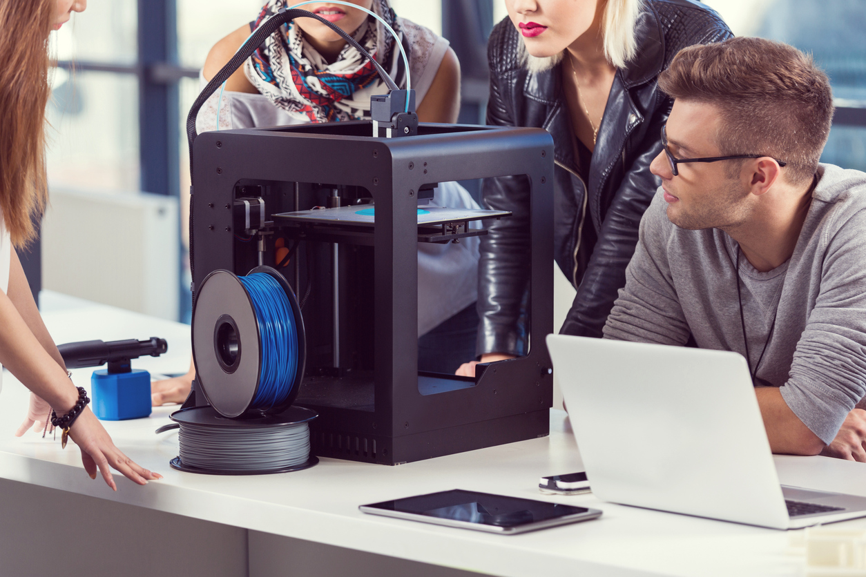 Start-up Business Team working by 3D printer