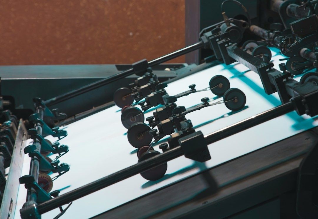 Film-processing equipment with rollers and guides in a restoration setup